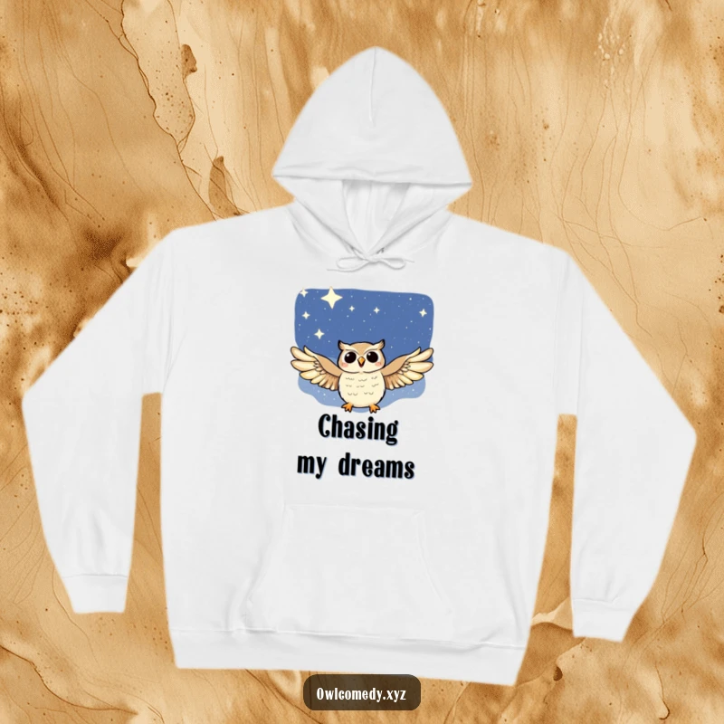 Funny hoodie displaying a serene owl with outstretched wings, gracefully soaring through a beautiful, star-filled night sky.