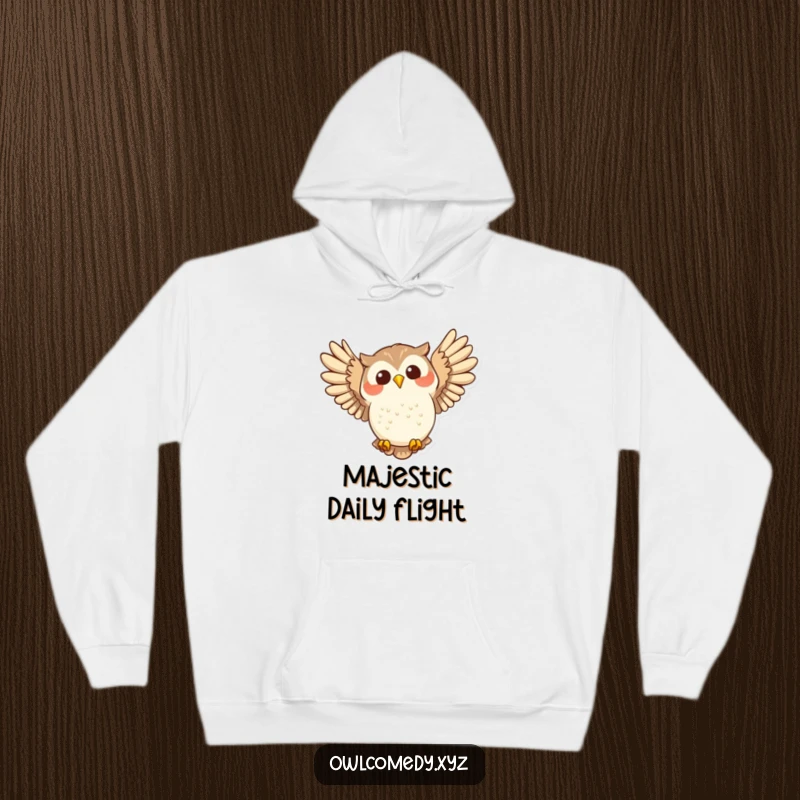 Funny joyful owl swooping with wide wings spread on a cozy hoodie, embodying happiness and freedom.