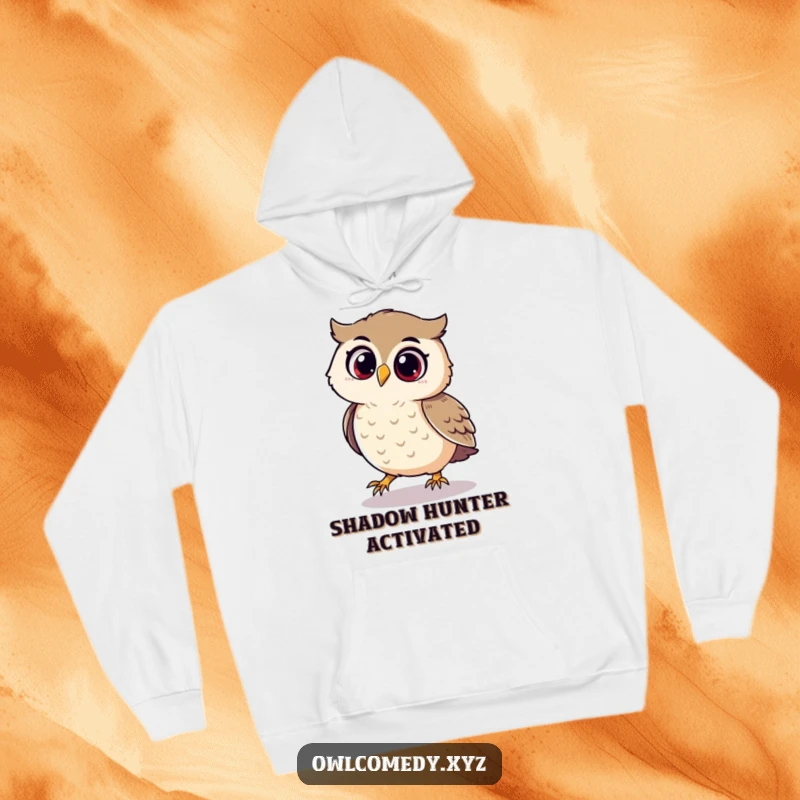 Funny hoodie featuring a playful owl joyfully chasing its shadow with pure delight.