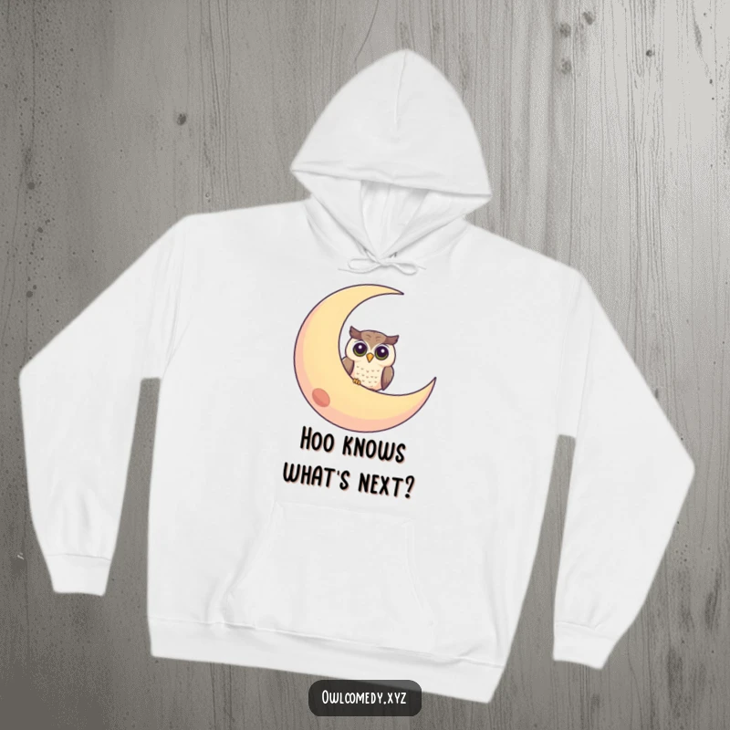 Funny hoodie displaying a charming curious owl peeking from behind a large, friendly crescent moon with a gentle smile.