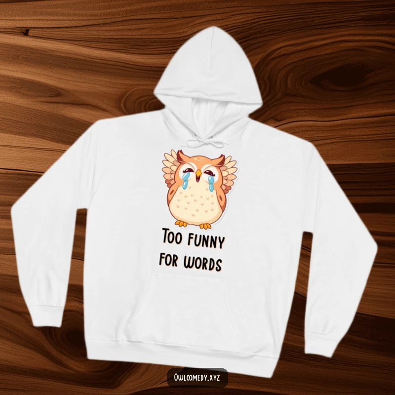 Funny kawaii owl hoodie, a plump, tearful owl giggling heartily, wings akimbo, radiating pure comedic delight.
