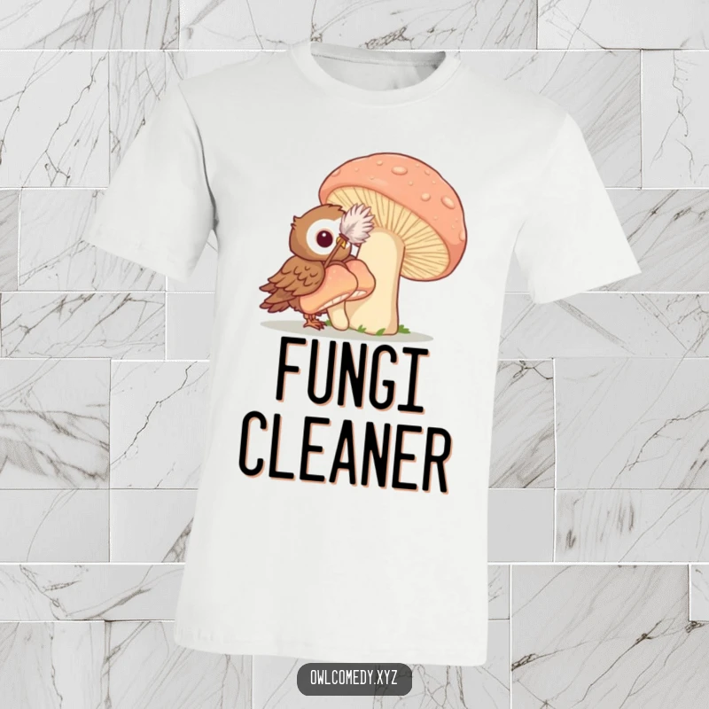 Funny t-shirt depicting an owl energetically using a feather duster to scrub a massive mushroom with a determined expression.