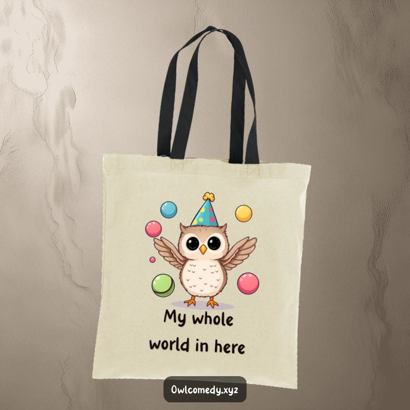 Funny tote bag showcasing a small, festive owl in a party hat joyfully juggling colorful balls with its wings.