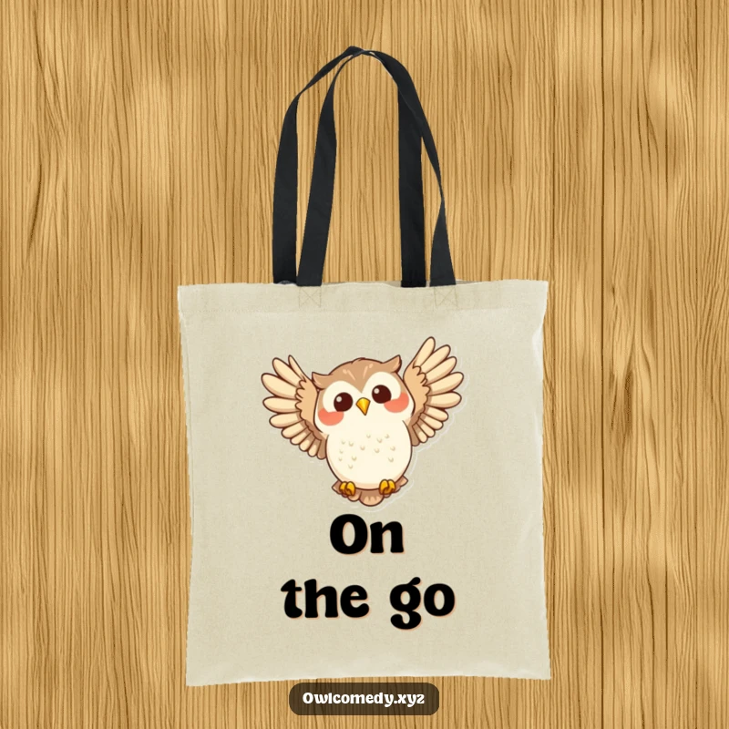 Funny joyful owl swooping with wide wings spread on a tote bag, representing freedom and pure happiness.